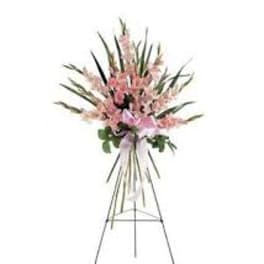 Tall pink floral spray on a standing easel