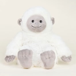White plush stuffed animal with a gray face and feet