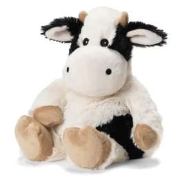 Plush black-and-white cow stuffed animal sitting upright
