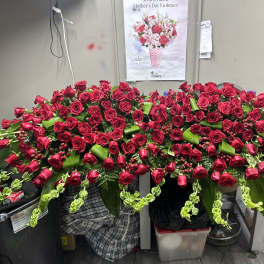 Large red rose casket spray