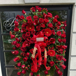 Large standing arrangement, all red roses