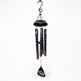 Black hanging wind chime with printed tubes and a floral pendant