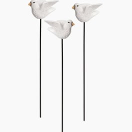 Three white bird garden stakes with long black rods