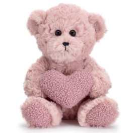 Pink teddy bear holding a heart