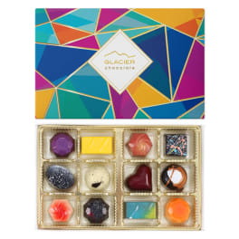 Box of assorted chocolates in a colorful geometric gift box