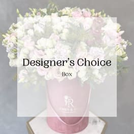 Large pastel bouquet in a pink hat box