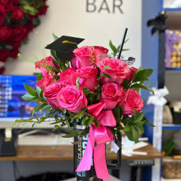 Arreglo con rosas para graduados
