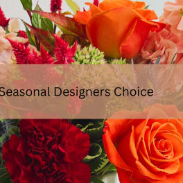 Seasonal mixed bouquet with orange roses and red flowers