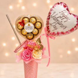 Thermos with eternal flowers and chocolates