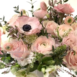 Pink and white mixed bouquet in a white vase
