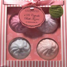 Boxed set of four cupcake-shaped bath fizzers in pink packaging