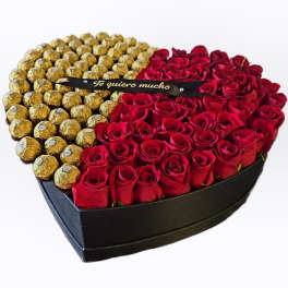 Heart-shaped box with red roses and gold-wrapped chocolates