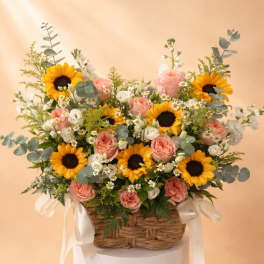 Sunshine Flowers Basket. The photo shows the deluxe size.