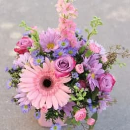 Pink and purple mixed bouquet with a large gerbera daisy
