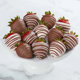 Chocolate-covered strawberries on a white pedestal stand