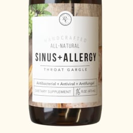 Amber bottle of sinus and allergy throat gargle supplement