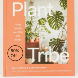 Orange book cover with large white title and tropical plant photos