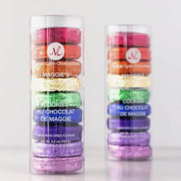 Two clear tubes of colorful stacked chocolates