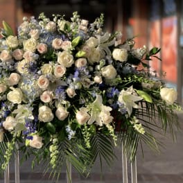 Large white and blush floral spray with lilies and roses
