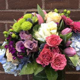 Colorful bouquet with roses, hydrangeas, and mixed blooms