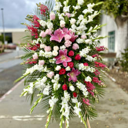 Large standing floral spray with pink and white flowers