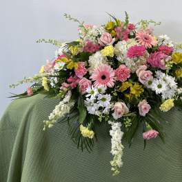 Large mixed floral spray with pink, white, and yellow blooms