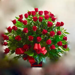 Large bouquet of red roses with a red ribbon bow