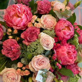 Pink and blush rose bouquet with peonies and small filler flowers