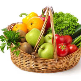 Wicker basket filled with assorted fruit and vegetables