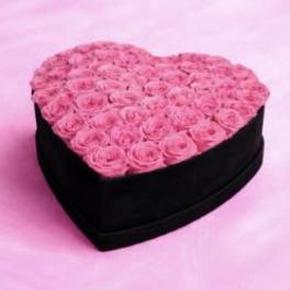Black heart shaped box with roses