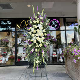 Tall standing floral spray with white roses and lilies