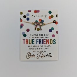Friendship card with a jeweled bow necklace on the front