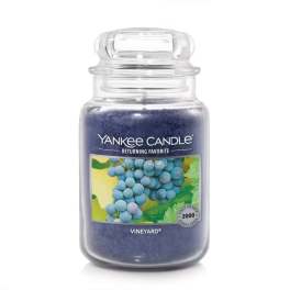 Blue Yankee Candle jar candle with grape label