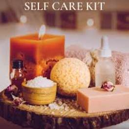 Self-care gift kit with a candle, lotion, and bath items