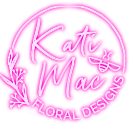 Bright pink circular floral logo with cursive text and a small bee illustration