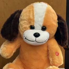 Orange and white plush dog toy with dark floppy ears