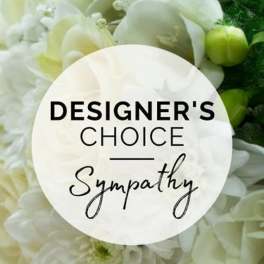 White sympathy floral arrangement with a designer's choice label