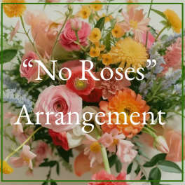 Colorful arrangement of mixed pink, orange, and yellow flowers with soft blue accents.