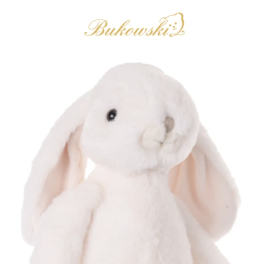 Plush white bunny with long pink-lined ears