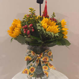 Sunflower Graduation Celebration Arrangement by The House of Flowers