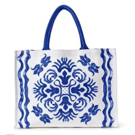 White tote bag with blue decorative pattern and handles