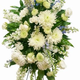 White and blue floral standing spray with chrysanthemums and roses