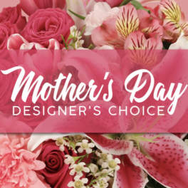 Pink floral arrangement with Mother's Day Designer's Choice text