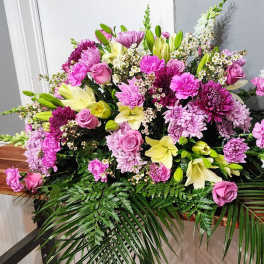 Large pink and white floral spray with lilies and roses