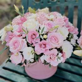 Pink and white rose bouquet in a round pink box
