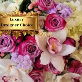 Mixed bouquet of pink and white roses with orchids and hydrangeas