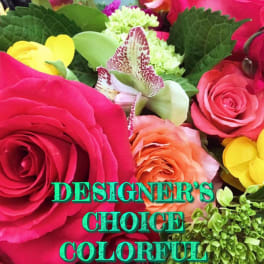 Bright mixed bouquet with roses and orchids in pink, yellow, and peach