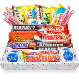 Assorted candy bars arranged in a gift basket