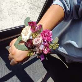 Handheld bouquet with pink and white flowers and eucalyptus