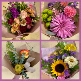 Four colorful hand-tied bouquets with mixed flowers and paper wraps
